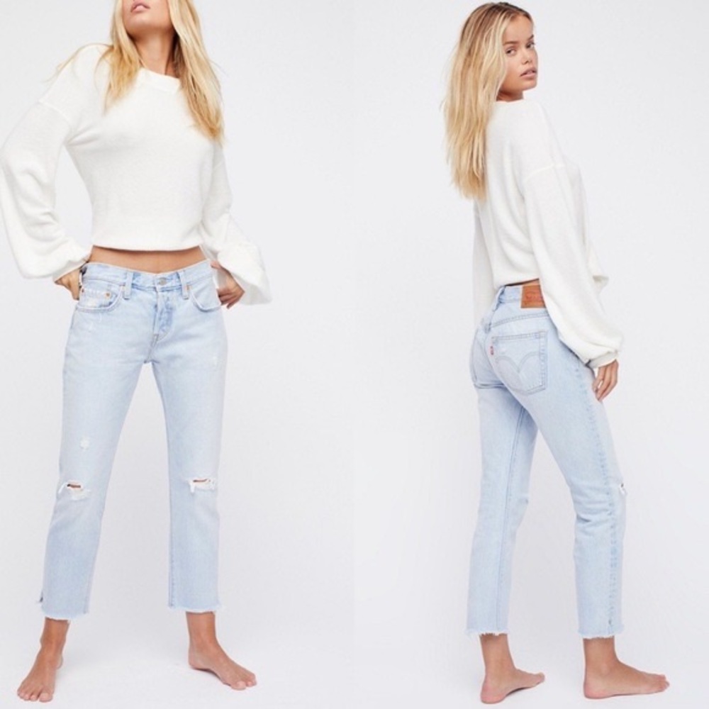 Levi’s 501 Crop Tapered Raw Hem Distressed Jeans in Bowie Blue